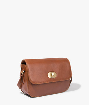 Isla leather crossbody in brown by Barbour. EQVVS WOMEN Side Angle Shot.