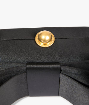 Bowela satin bow clutch in black by Ted Baker. EQVVS WOMEN Detail Shot.