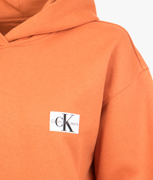 Woven label hoodie in burnt clay