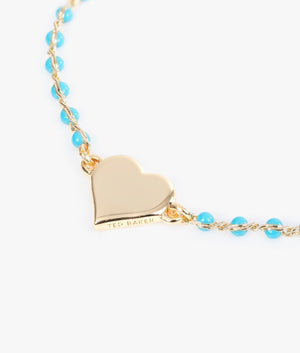 Rainba heart bracelet in gold and turquoise.