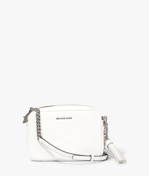 Jet set camera bag in optic white by Michael Kors. EQVVS Front Angle Shot.