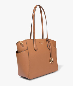Marylin tote in luggage by Michael Kors. EQVVS Side Angle Shot.
