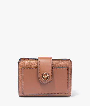 MK charm wallet in luggage
