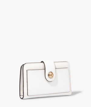 MK charm bifold wallet in optic white by Michael Kors. EQVVS WOMEN Side Angle Shot.