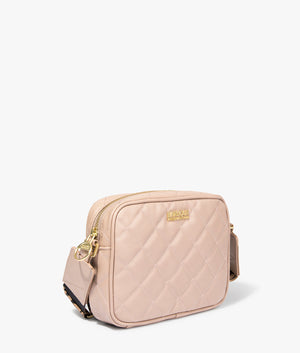 Sloane quilted crossbody in camel by Barbour International. EQVVS WOMEN Side Angle Shot.
