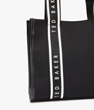 Georjea branded webbing canvas small tote in black by Ted Baker. EQVVS WOMEN Detail Shot.