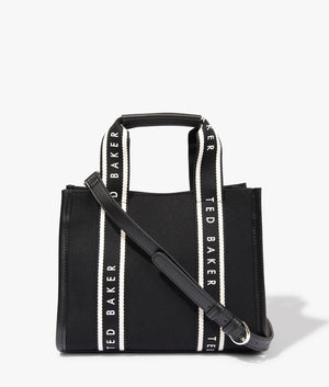 Georjea branded webbing canvas small tote in black by Ted Baker. EQVVS WOMEN Front Angle Shot.