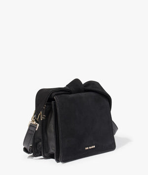 Niyah soft knot bow suede mini crossbody in black