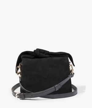 Niyah soft knot bow suede mini crossbody in black