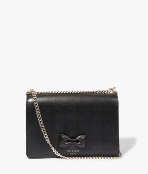 Baeleen bow detail leather crossbody in black by Ted Baker. EQVVS WOMEN Front Angle Sot.
