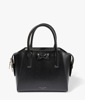 Baelini bow detail small tote in black by Ted Baker. EQVVS WOMEN Front Angle Shot.
