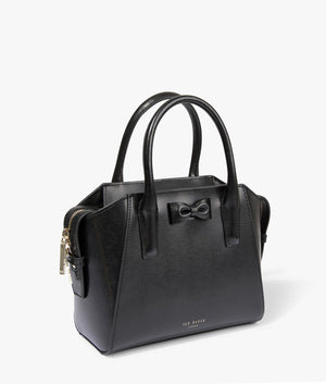 Baelini bow detail small tote in black by Ted Baker. EQVVS WOMEN Side Angle Shot.