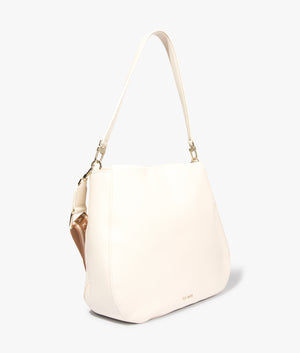 Darciel branded webbing hobo bag in ivory by Ted Baker. EQVVS WOMEN Side Angle Shot.