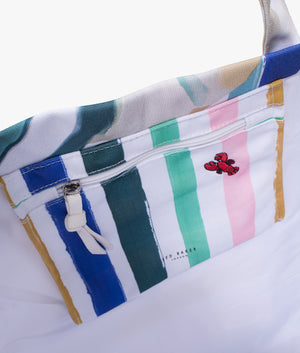 Shelyss printed canvas shopper and flip flops in green