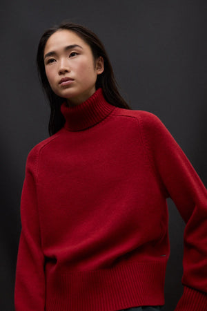 Caqui roll neck knit in crimson red
