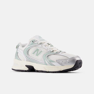 530 trainer in silver metallic and mosaic green