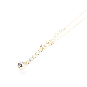 Petrae petite bow pendant