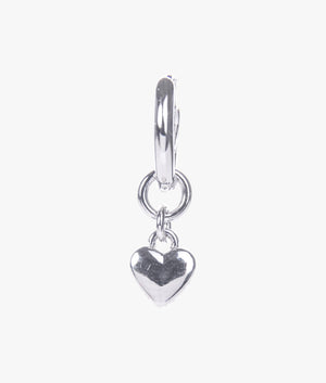 Harrye tiny heart huggie earrings in silver.