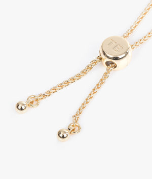 Rainba heart bracelet in gold and turquoise.
