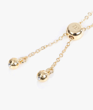 Rainba heart bracelet in gold and black.