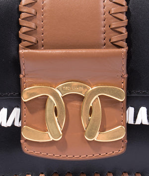 Edasina whipstitch detail mini crossbody in black