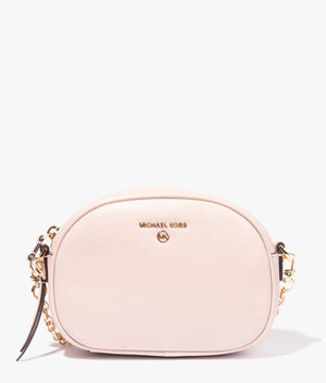 Jet set oval camera crossbody in soft pink