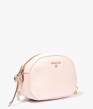 Jet set oval camera crossbody in soft pink