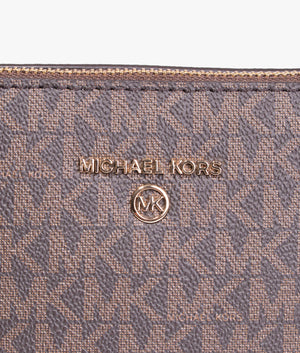Jet set charm dome crossbody in brown acorn