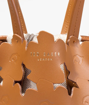 Florene flower laser cut mini tote in brown
