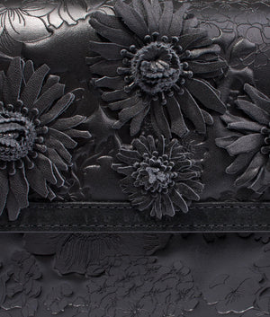Floresa laser cut shoulder bag in black