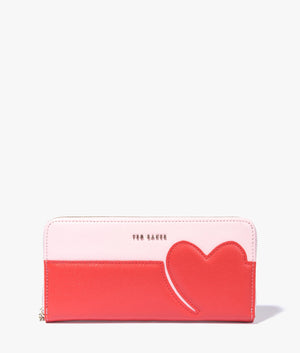 Hunieh heart zip around purse in pale pink
