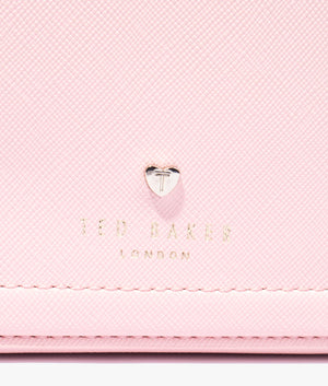 Stinah heart studded small camera bag in pale pink