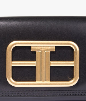 Tikay statement hardware leather purse in black